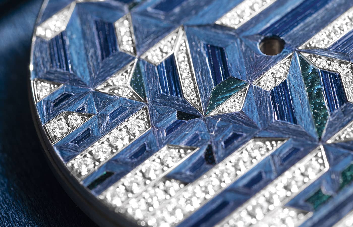  Close up of the Piaget Gleaming Savor watch dial set with diamond, sycamore wood, straw and elytron maquetry by Rose Saneuil, from the Solstice by Piaget High Jewellery collection, Chapter Two