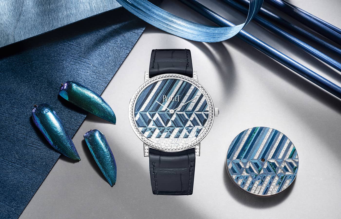 Piaget Gleaming Savor watch in white gold, diamond, sycamore wood, straw and elytron maquetry by Rose Saneuil on a dark blue alligator leather strap, from the Solstice by Piaget High Jewellery collection, Chapter Two
