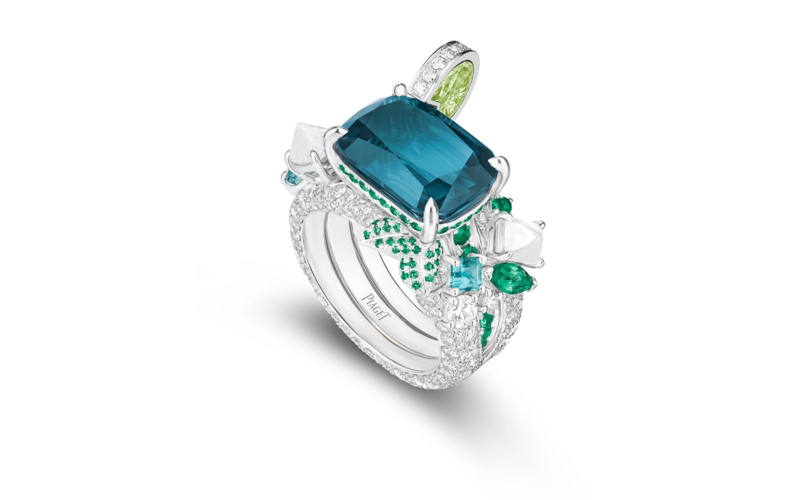 Piaget Royal Blue transformable ring in white gold, an 8.68-ct. cushion-cut indicolite tourmaline, emerald, peridot and diamond, from the Solstice by Piaget High Jewellery Collection, Chapter Two  