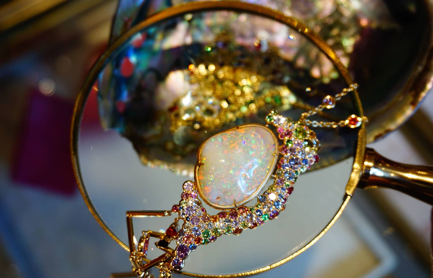 K&Co London Aurelia Aurita sautoir necklace with rare opalised clam shell and multi-coloured sapphires, tsavorites and spessartite garnets