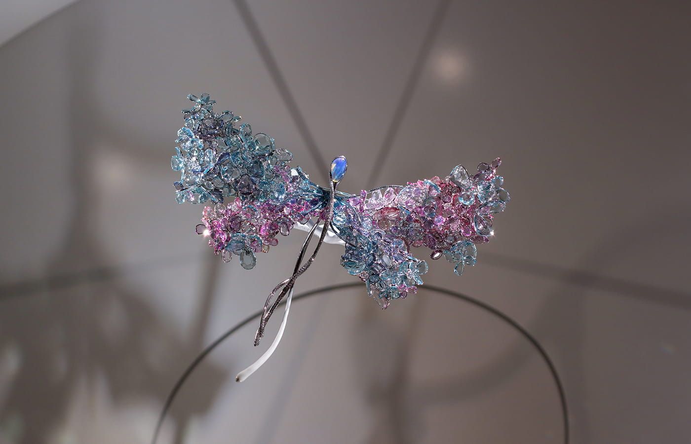 Feng J 'Blooming Dragonfly Diva’ brooch with opal, double rose-cut pink sapphires, purple spinel, aquamarine, diamond beads, aquamarine and further diamonds in titanium and 18k gold