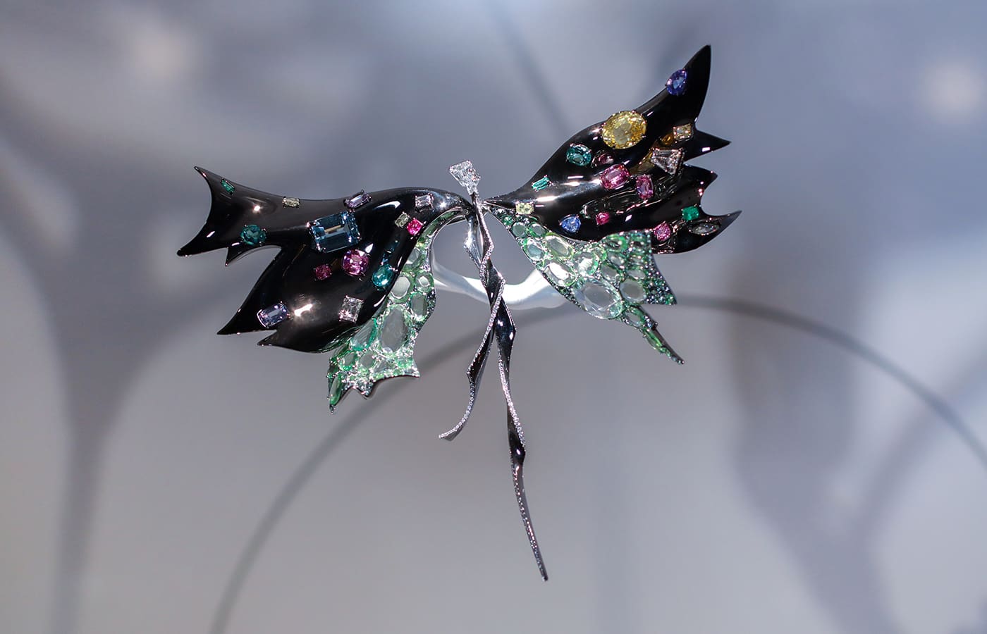 Feng J ‘Matisse Dragonfly’ brooch with emeralds, aquamarines, sapphires, spinel, tourmaline, double rose-cut tsavorites and white diamonds in lacquer on titanium and 18k gold