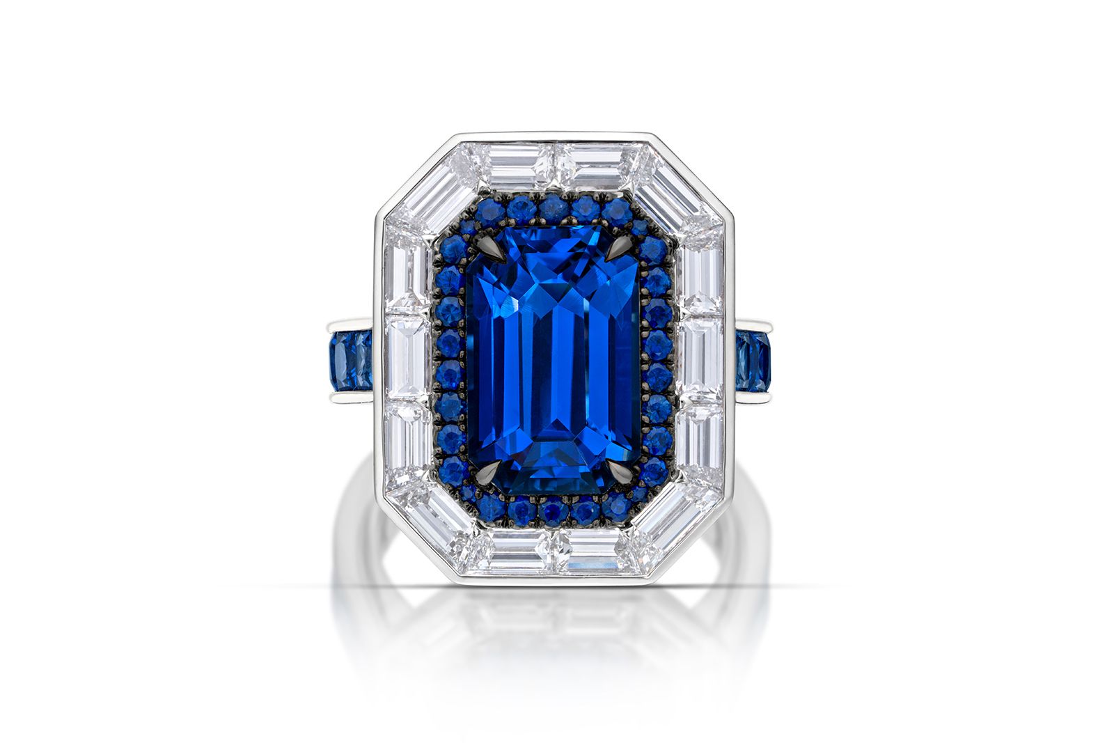  AGTA Spectrum Awards™ 2022 Classical 1st Place - Gabriel Angulo of Pompos Jewelry Corporation with a 6.29 carat blue Ceylon sapphire accented with 14 custom-cut baguette diamonds, 10 princess-cut sapphires, 30 round sapphires and 58 round brilliant-cut diamonds