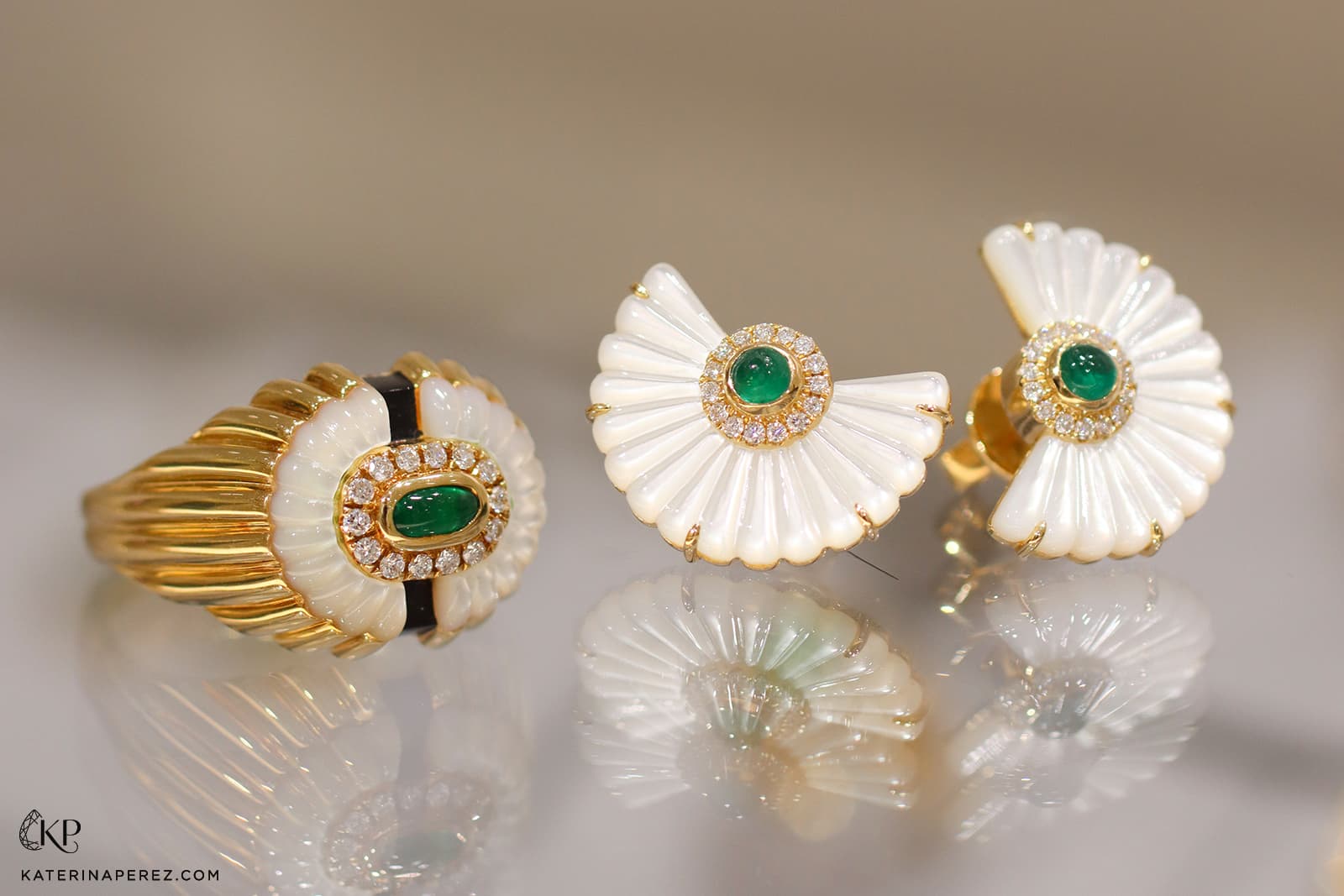State Property Alara Snowdrop ring and earrings with emerald cabochons, diamonds, carved mother of pearl and black enamel in 18k yellow gold