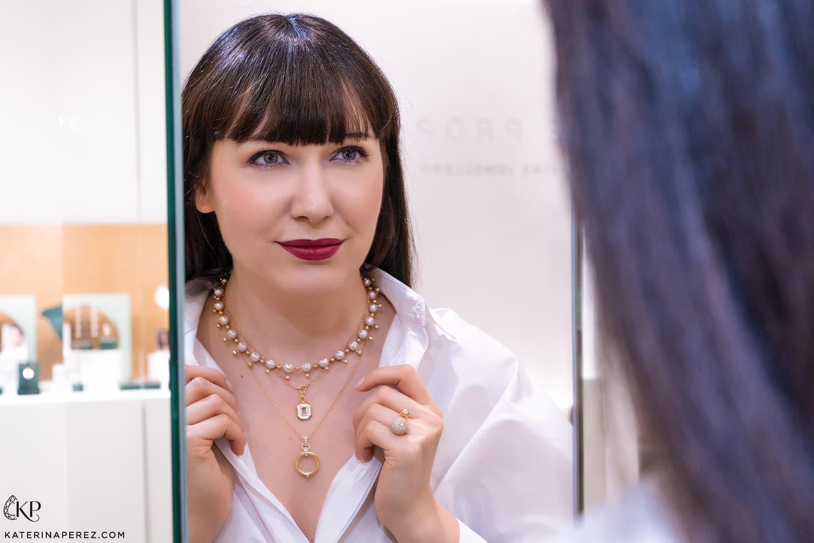 Katerina Perez wears necklaces by State Property, including the Nemara Pearl necklace (top) with Akoya pearls and diamonds in 18k yellow gold 