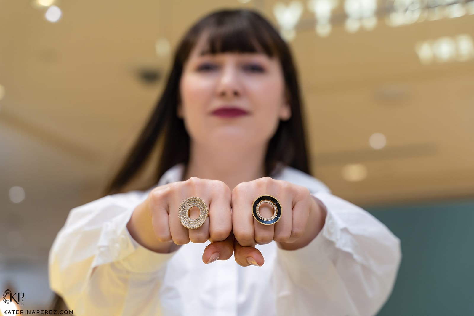  Katerina Perez wears a duo of rings by State Property, including the Drew Pavé Drape ring with 5.48 carats of diamonds in 18k yellow gold