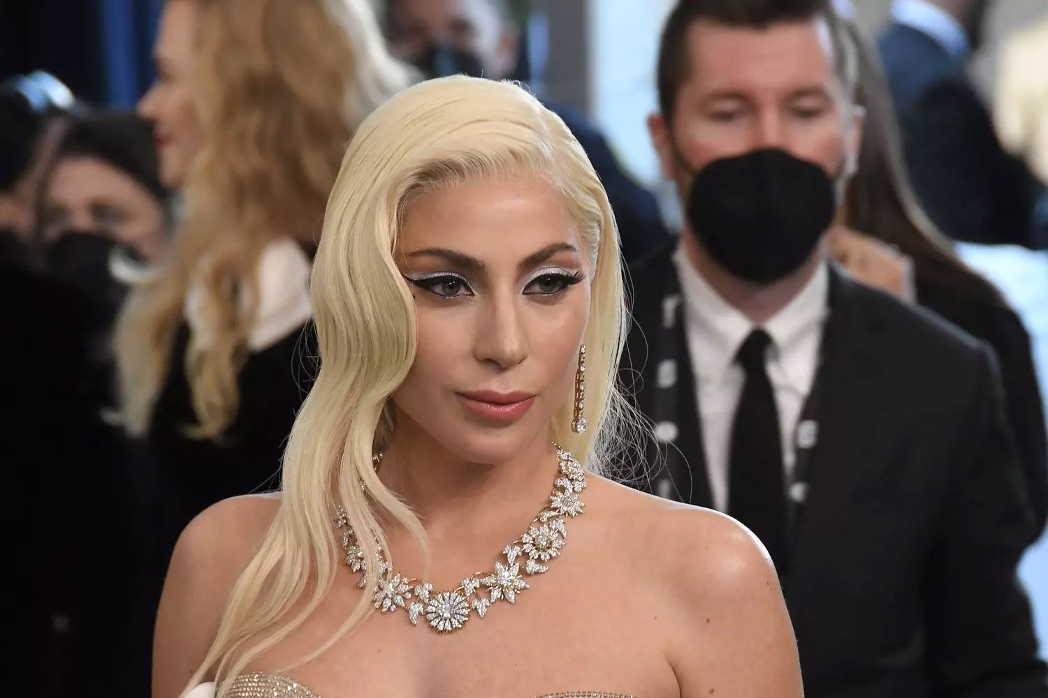 Lady Gaga wearing the Schlumberger for Tiffany & Co., Flowers and Leaves necklace at the SAG Awards 2022