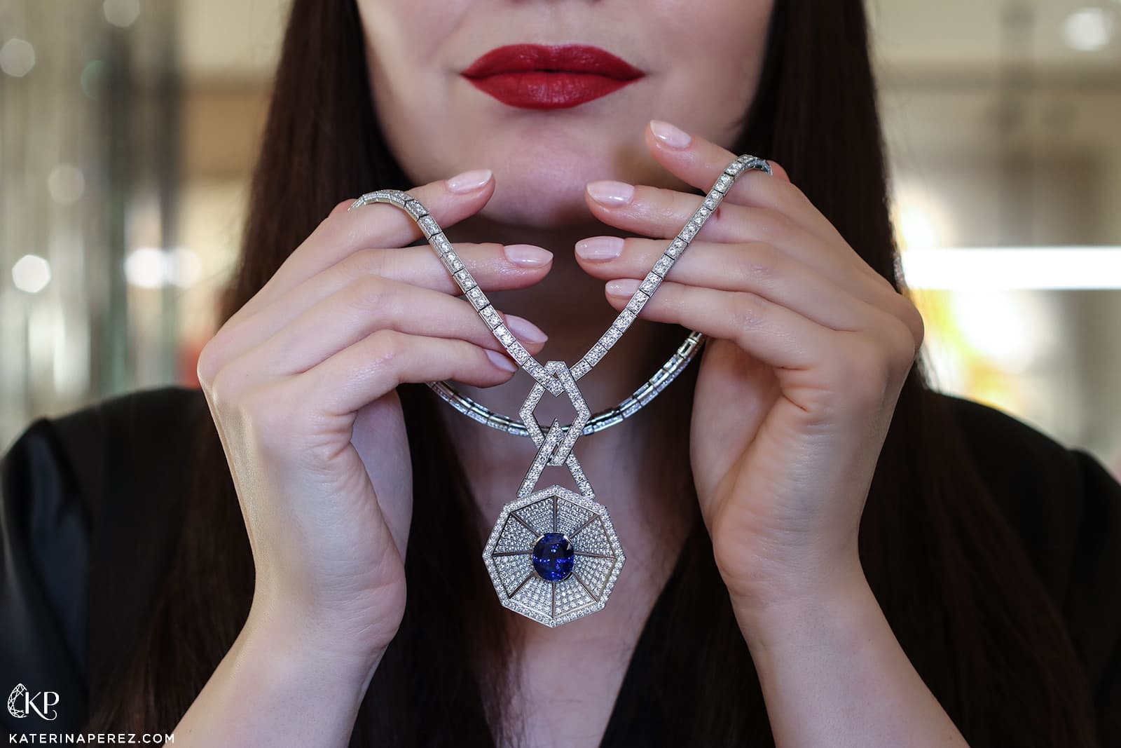 Katerina Perez holding one of Bucherer Fine Jewellery's latest high jewellery creations