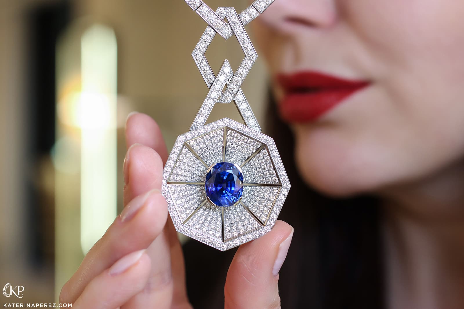  The Bucherer High Jewellery necklace is set with a  13.56-ct cushion-shaped sapphire and  diamond pavé