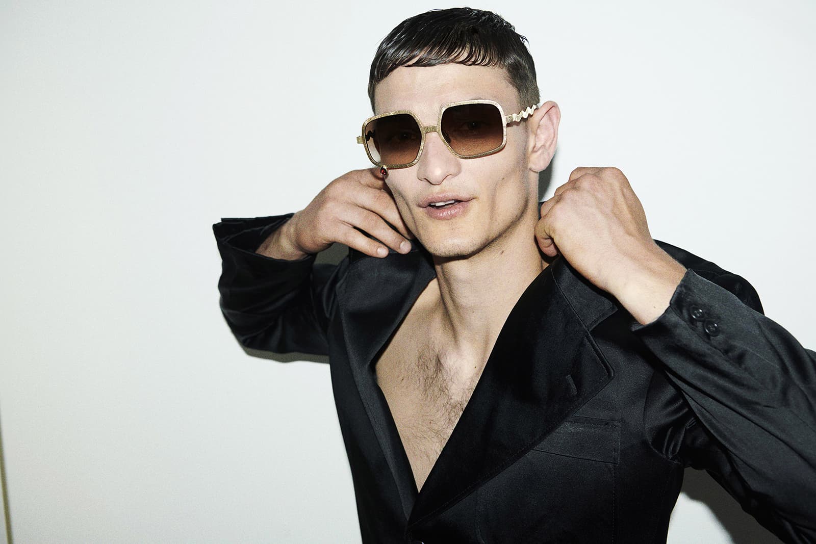  Francis de Lara Eyewear featuring a pear-shaped garnet