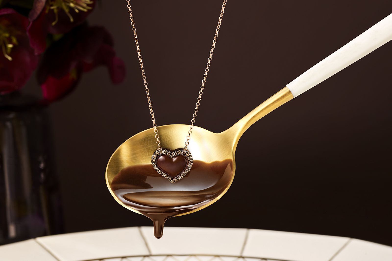  Close up of the GODIVA x Le Vian enamel and Chocolate diamond fine jewellery pendant 