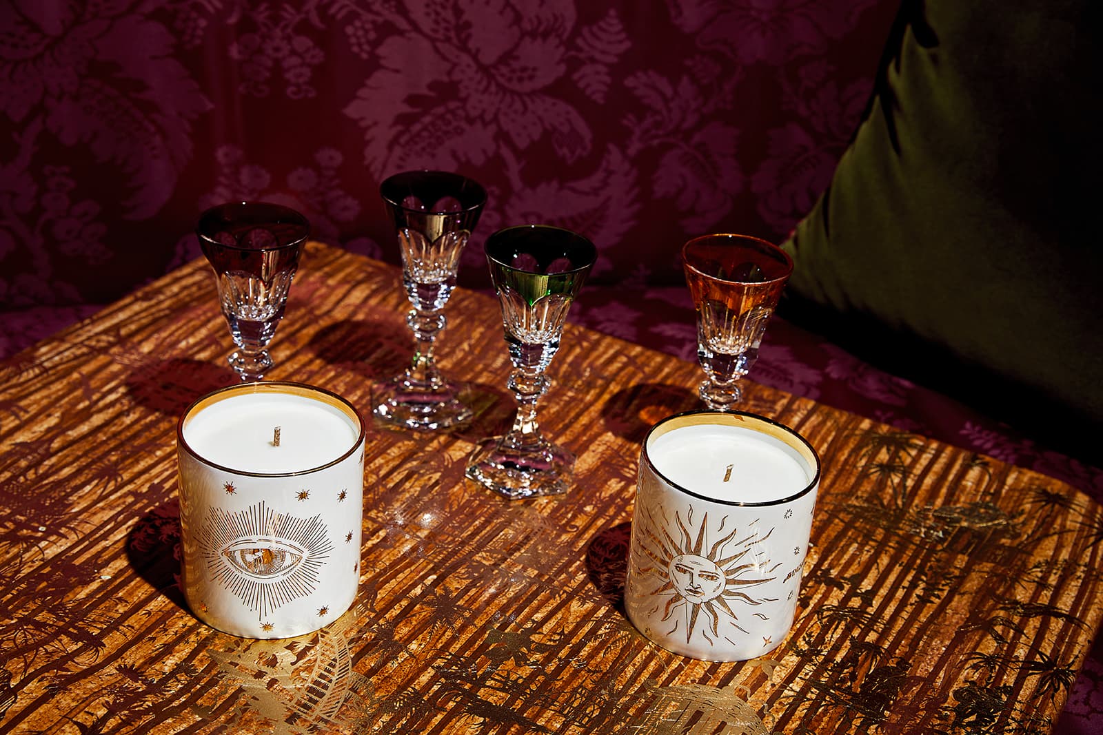   Candles by Wings of Wisdom set in bone china and gold vessels
