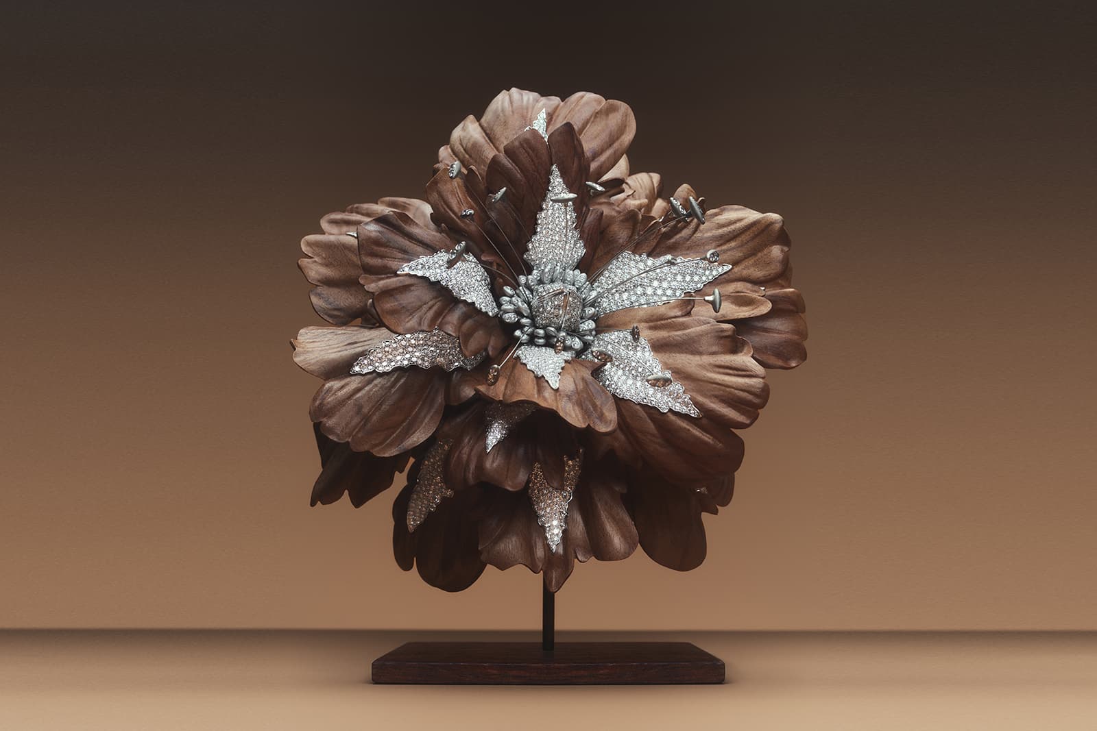  Boucheron Bois Diamant brooch from the Carte Blanche Ailleurs High Jewellery collection in Palissandre Santos wood, diamond and white gold 