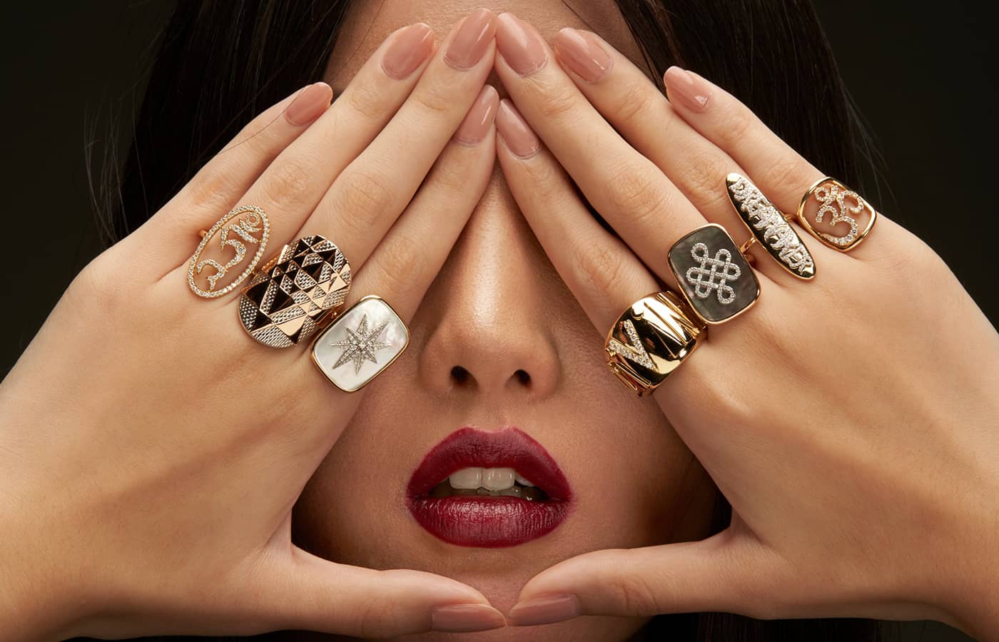 Model wearing AWKN1 yellow gold and diamond rings