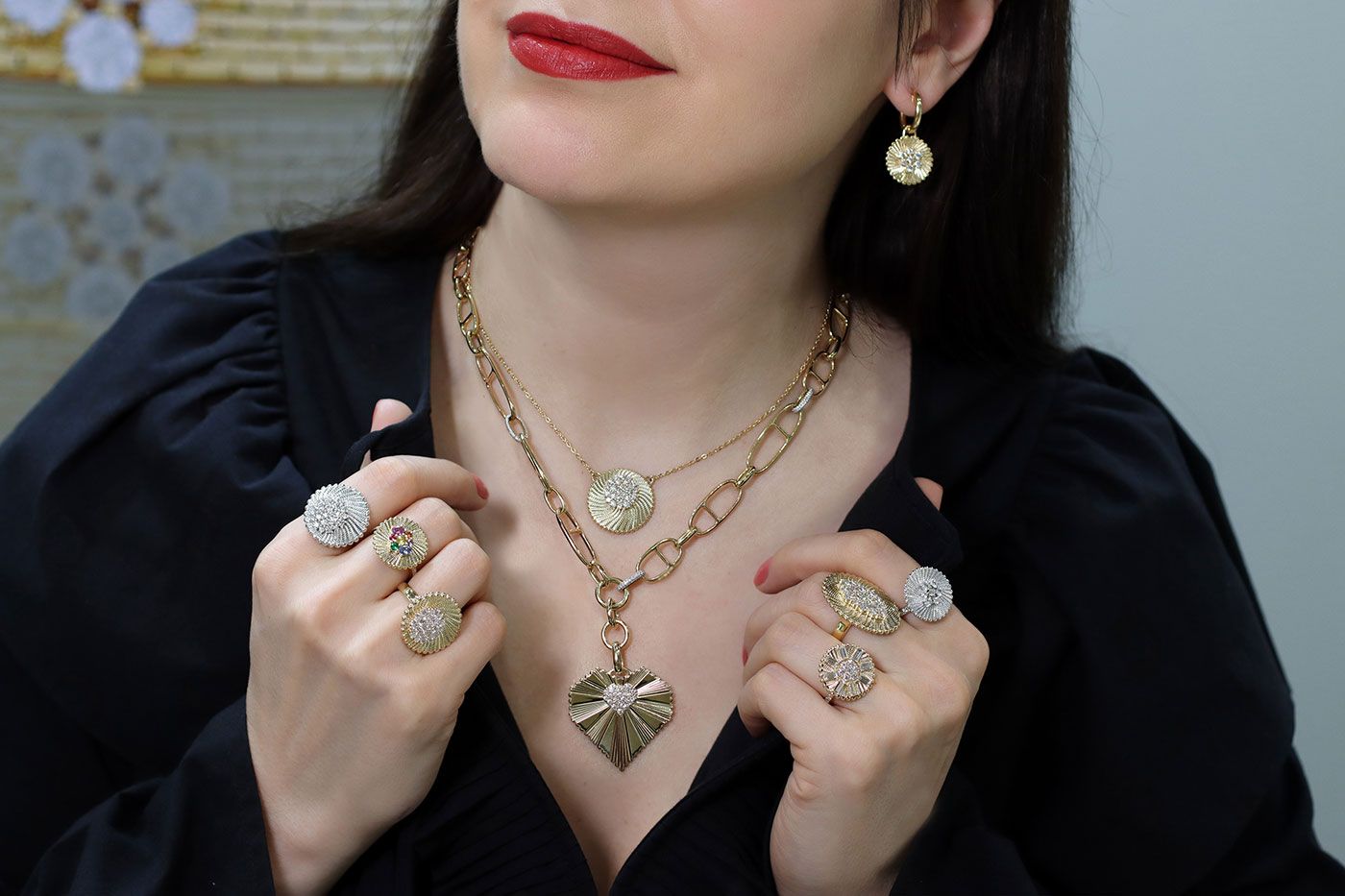 Katerina Perez wearing gold and diamond jewels from AWKN1