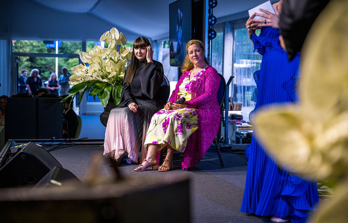 Katerina Perez on stage with other guests to celebrate Constantin Wild and discuss the business' passion for coloured gemstones