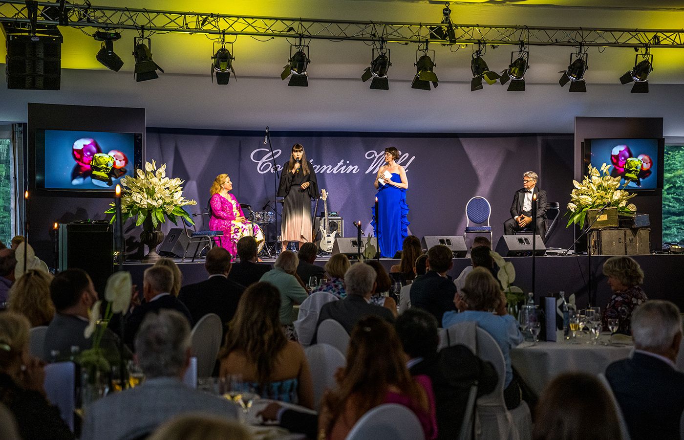 Katerina Perez gives an address on stage at the Constantin Wild 175th anniversary celebrations