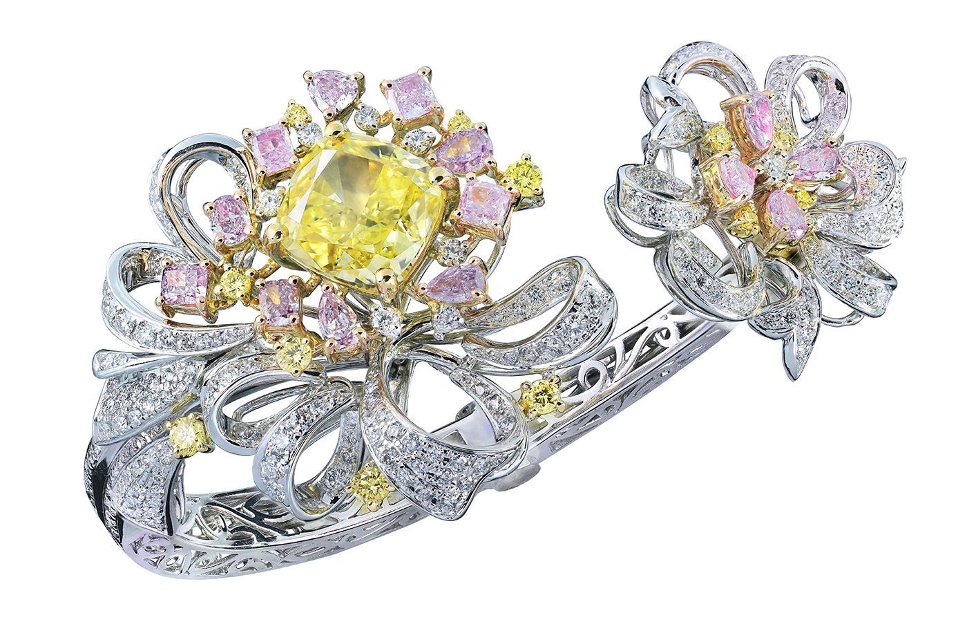 Caratell bracelet with a 5.02-carat fancy intense green-yellow diamond alongside fancy to fancy vivid pink diamonds