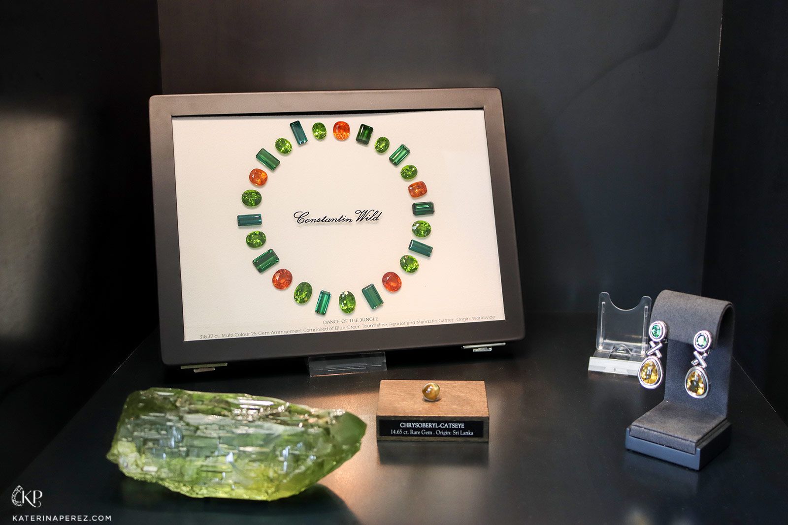  Gemstone layouts and specimens amassed by Constantin Wild, including a cat's eye chrysoberyl