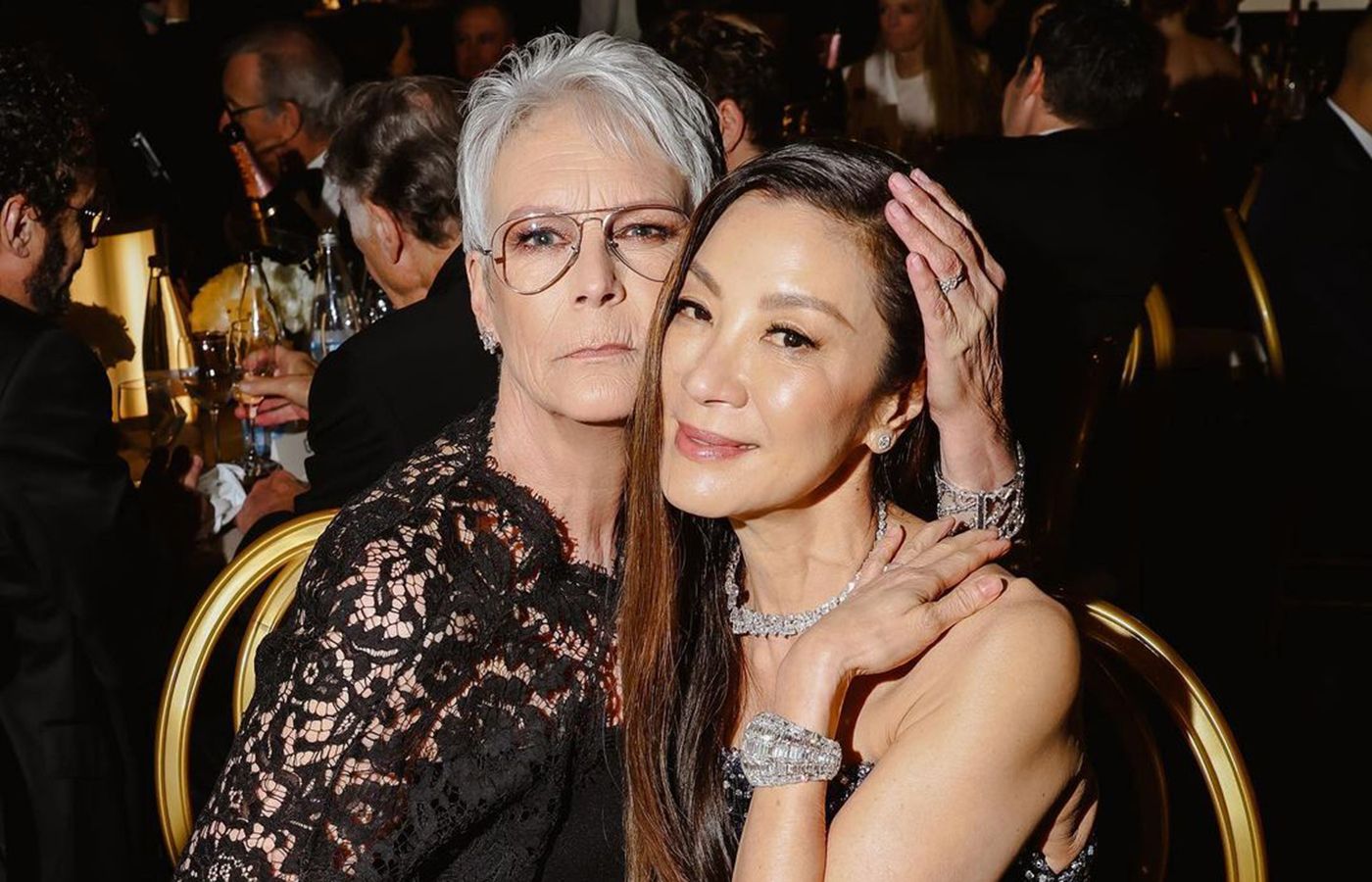 Michelle Yeoh in  a diamond jewellery suite by Moussaieff and Jamie Lee Curtis in jewels by Cathy Waterman