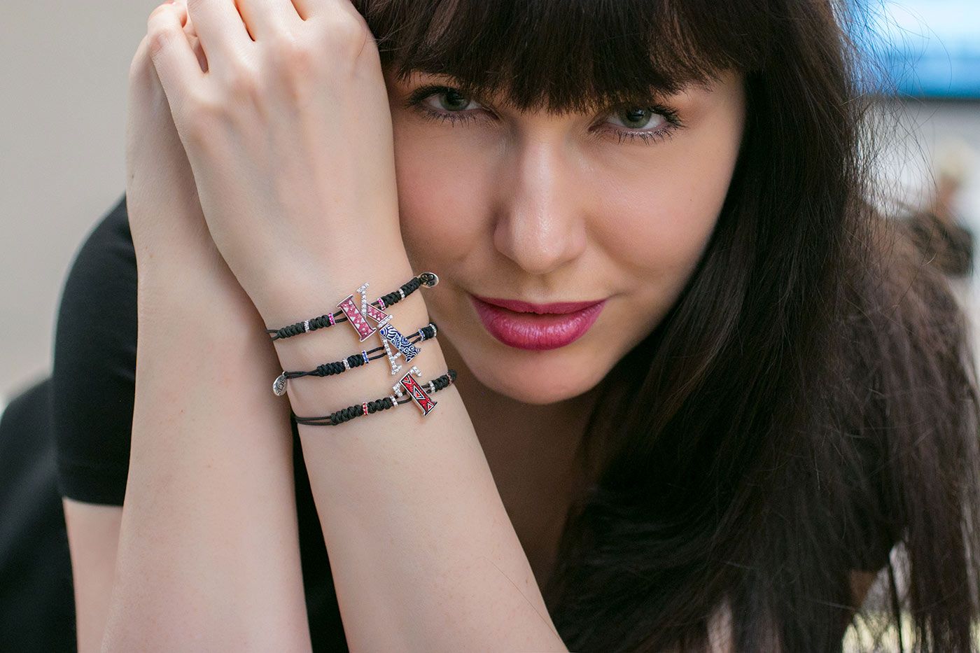 Katerina Perez wears bracelets from the SICIS Alphabet collection