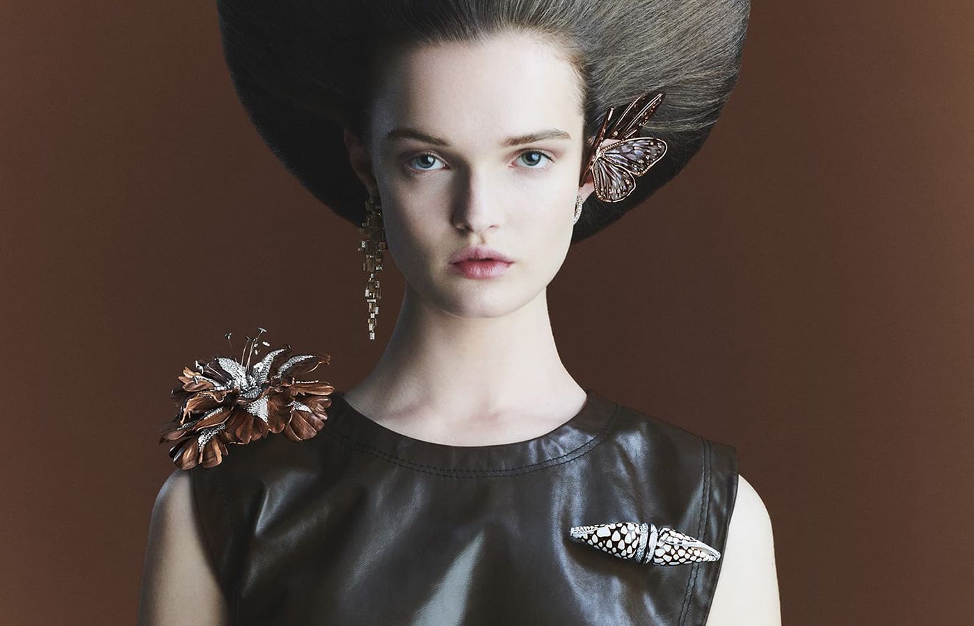  Boucheron Palissandre Santos wood, diamond, white gold, natural butterfly wing, natural shell Conus Marmoreus and quartz Papillon earrings, Cristaux Pendants earring, Bois Diamant brooch and Jack Coquillage brooch from the Carte Blanche Ailleurs High Jewellery collection