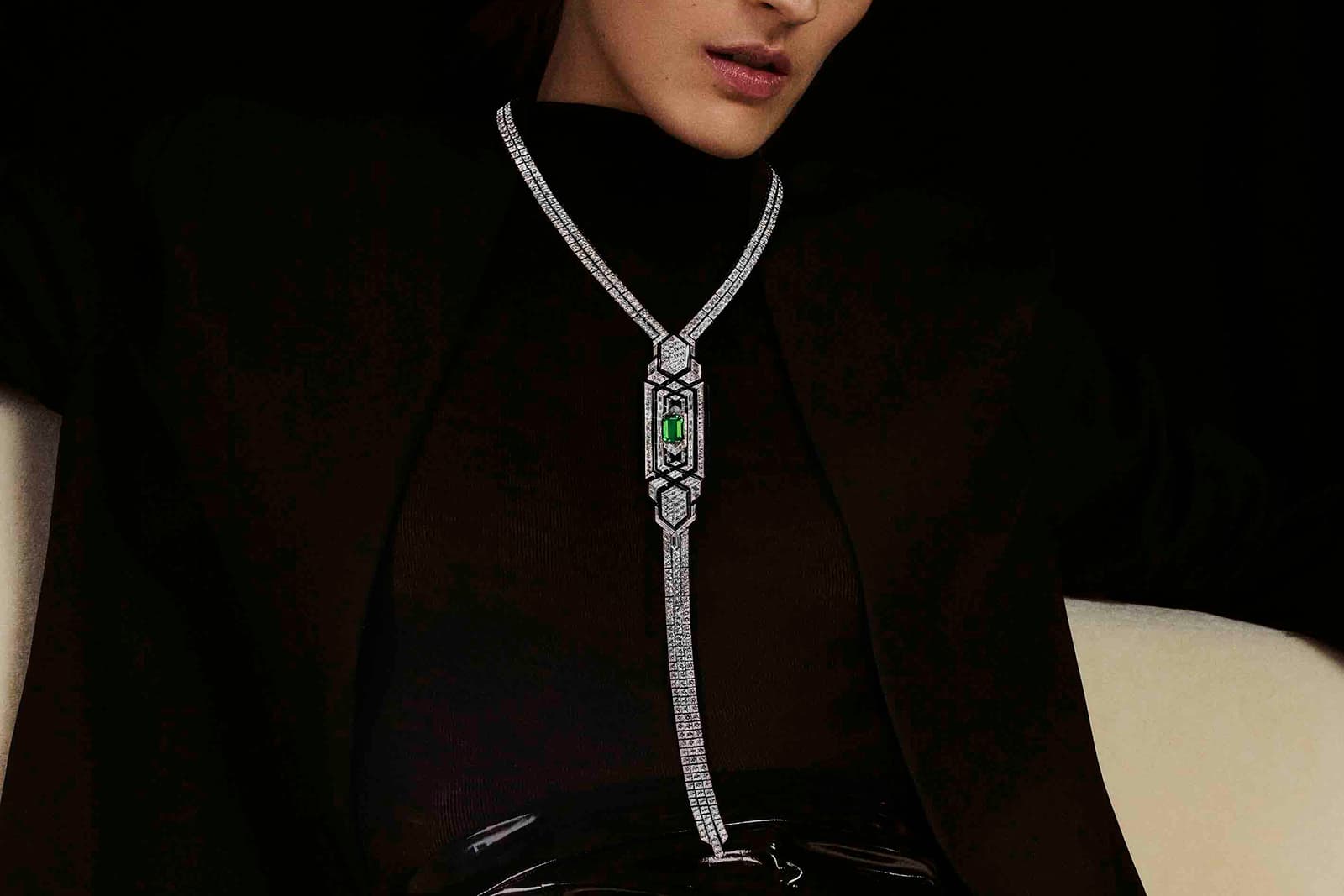  Boucheron Cravate Émeraude necklace and detachable brooch from the ‘A History of Style, Art Déco’ High Jewellery collection with onyx, diamonds, black lacquer and an 8.02 carat Zambian emerald, set in white gold and platinum