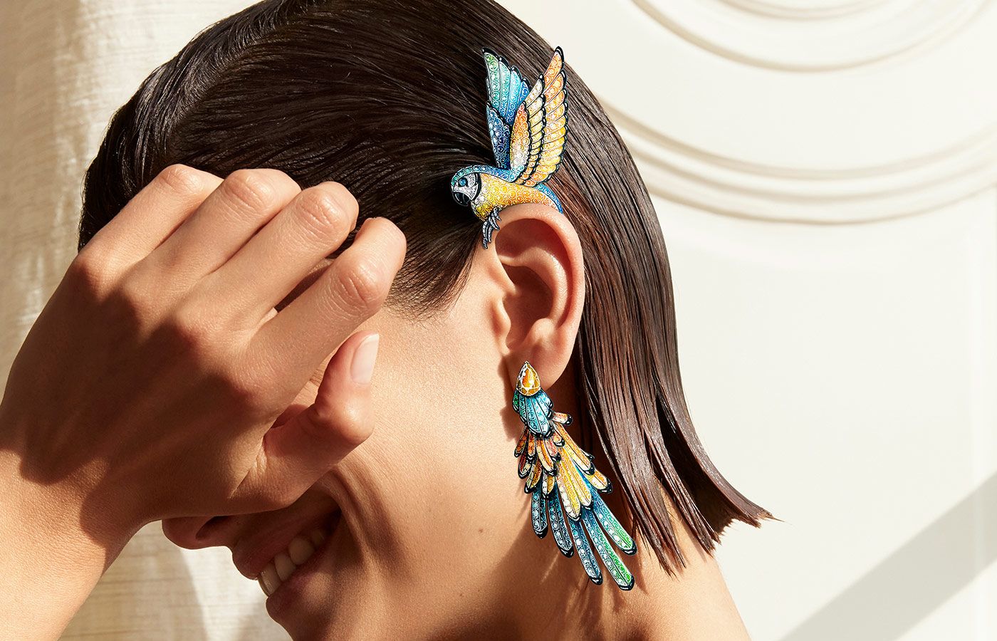 Boucheron 'Nuri' ear cuff with multicoloured sapphires, aquamarine and yellow beryl set in titanium from the Paris Vu Du 26 High Jewellery Collection