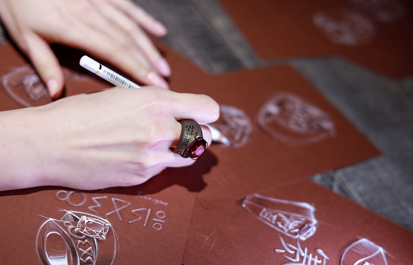 A closer look at the Iryna ring with a 20.90 carat rhodolite garnet and classical Sanskrit accents from the Mashandy Origyne collection