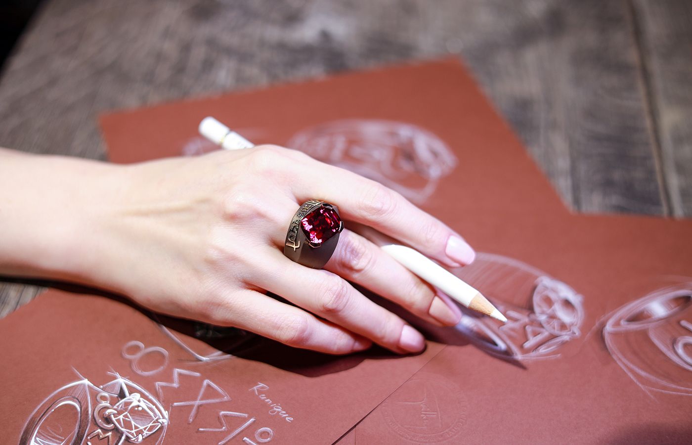 Philippe Guilhem Iryna ring with a 20.90 carat rhodolite garnet and classical Sanskrit embellishments from the Mashandy Origyne collection
