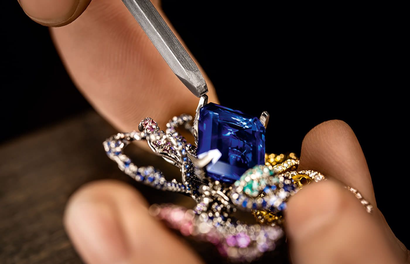  Close up of Dior Joaillerie Rose necklace in white and yellow gold, diamonds, blue and purple sapphires, tsavorite garnets, emeralds, purple and demantoid garnet, amethyst and Paraiba-type tourmaline from the Dearest Dior High Jewellery collection