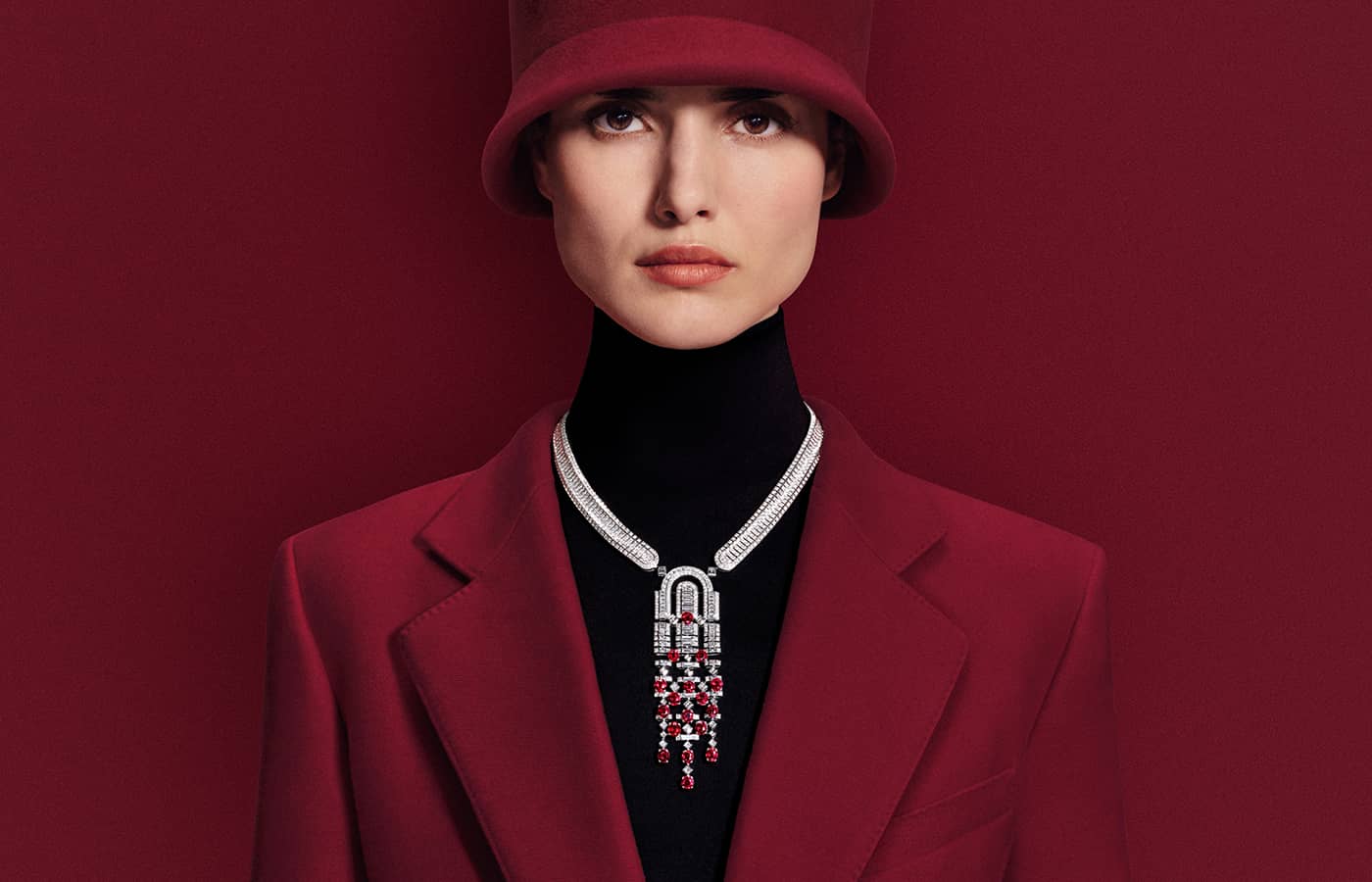  Rolling Red necklace with detachable brooch with 17 oval rubies from Mozambique for a total weight of 18.82 carats, paved with diamonds in 18k white gold from the Boucheron Like a Queen High Jewellery Collection