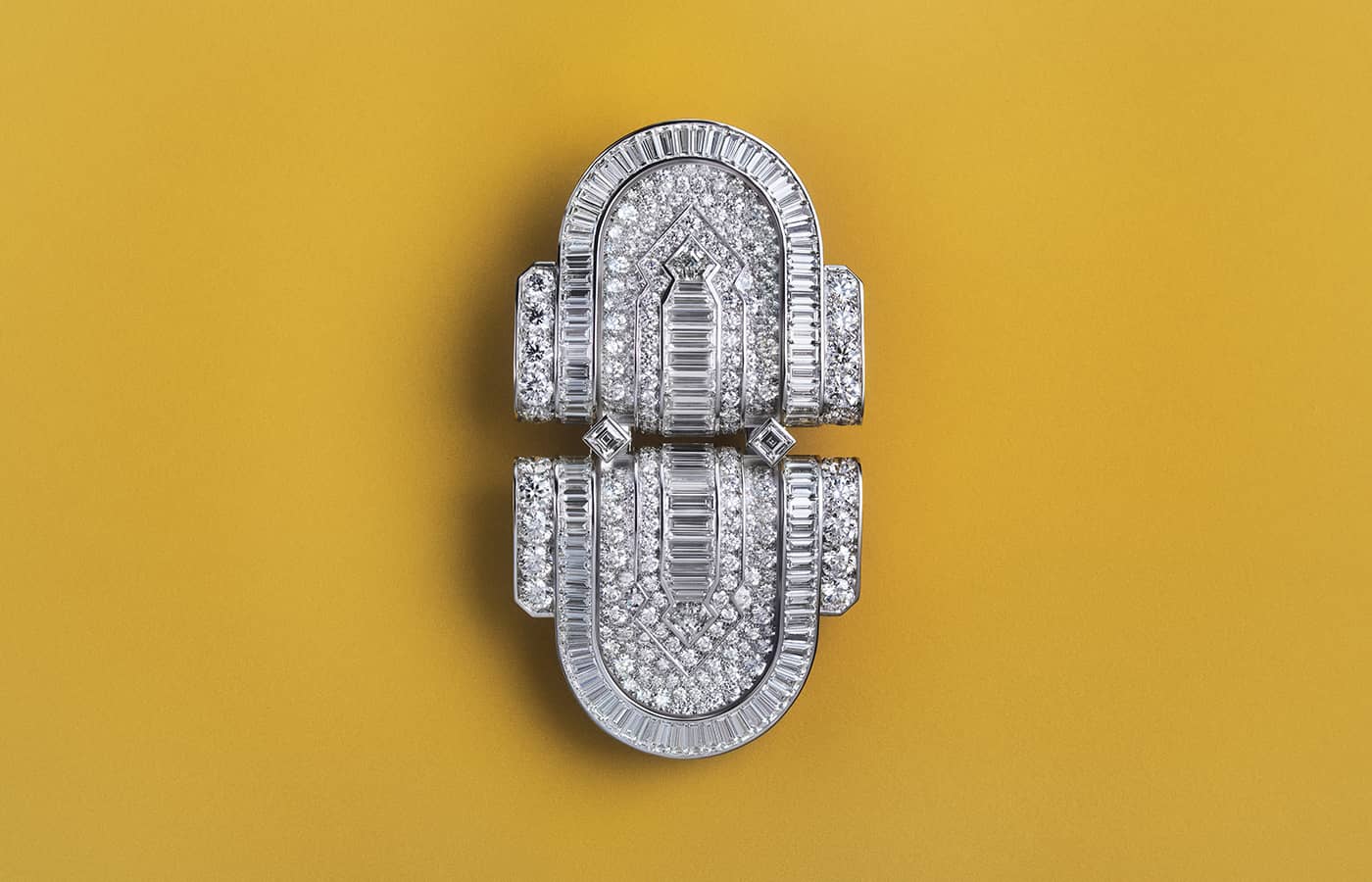  Diamond-set double clip brooch from the Boucheron Like a Queen High Jewellery Collection, which can also be worn on a leather choker 