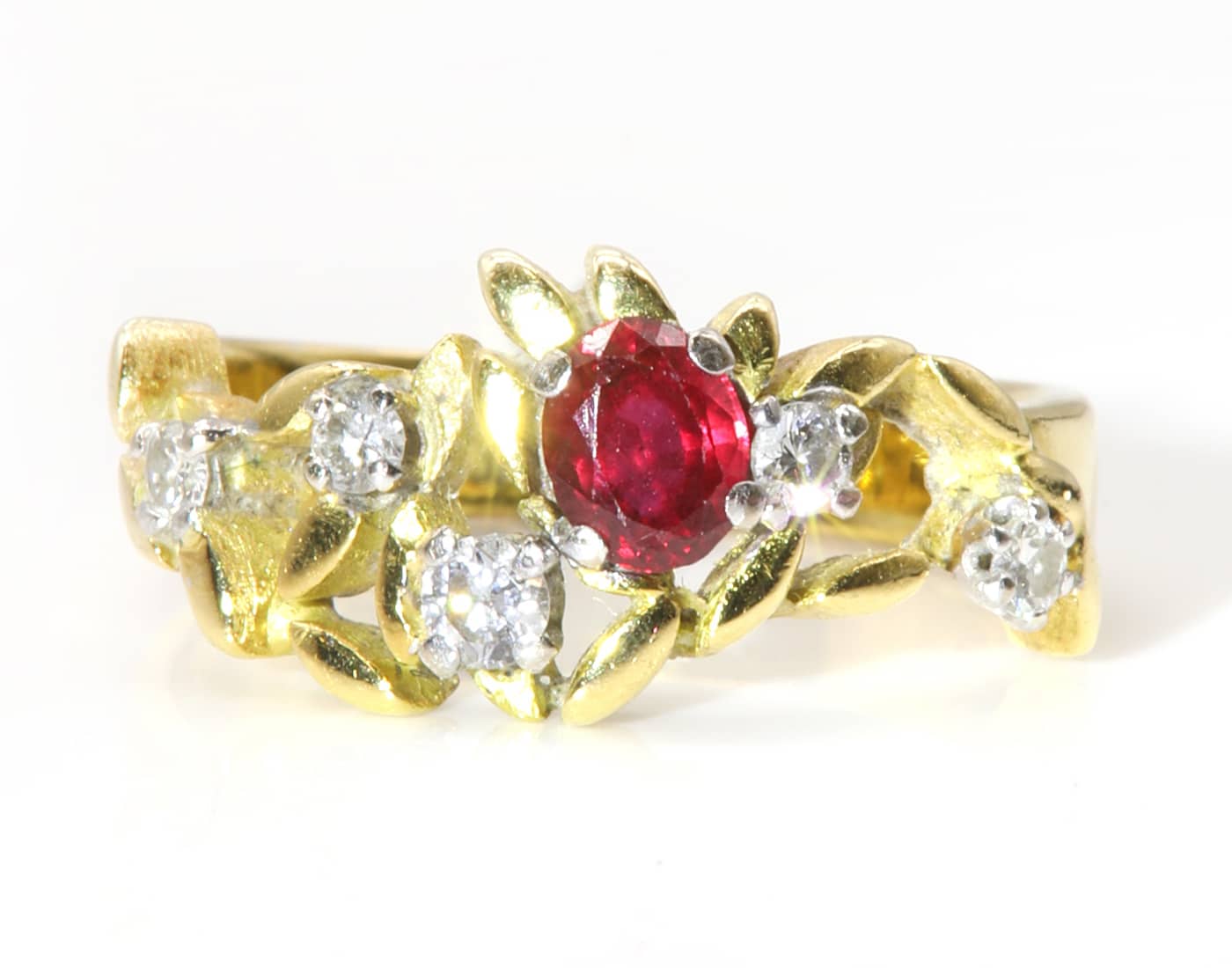  A 1975 gold ruby and diamond ring by John Donald