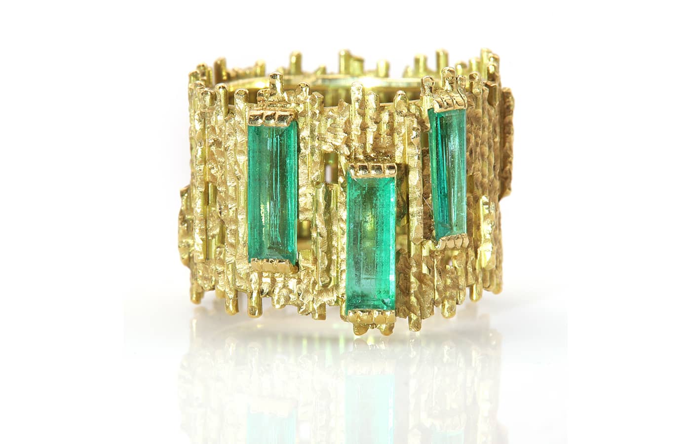  An 18ct gold emerald ring by Andrew Grima