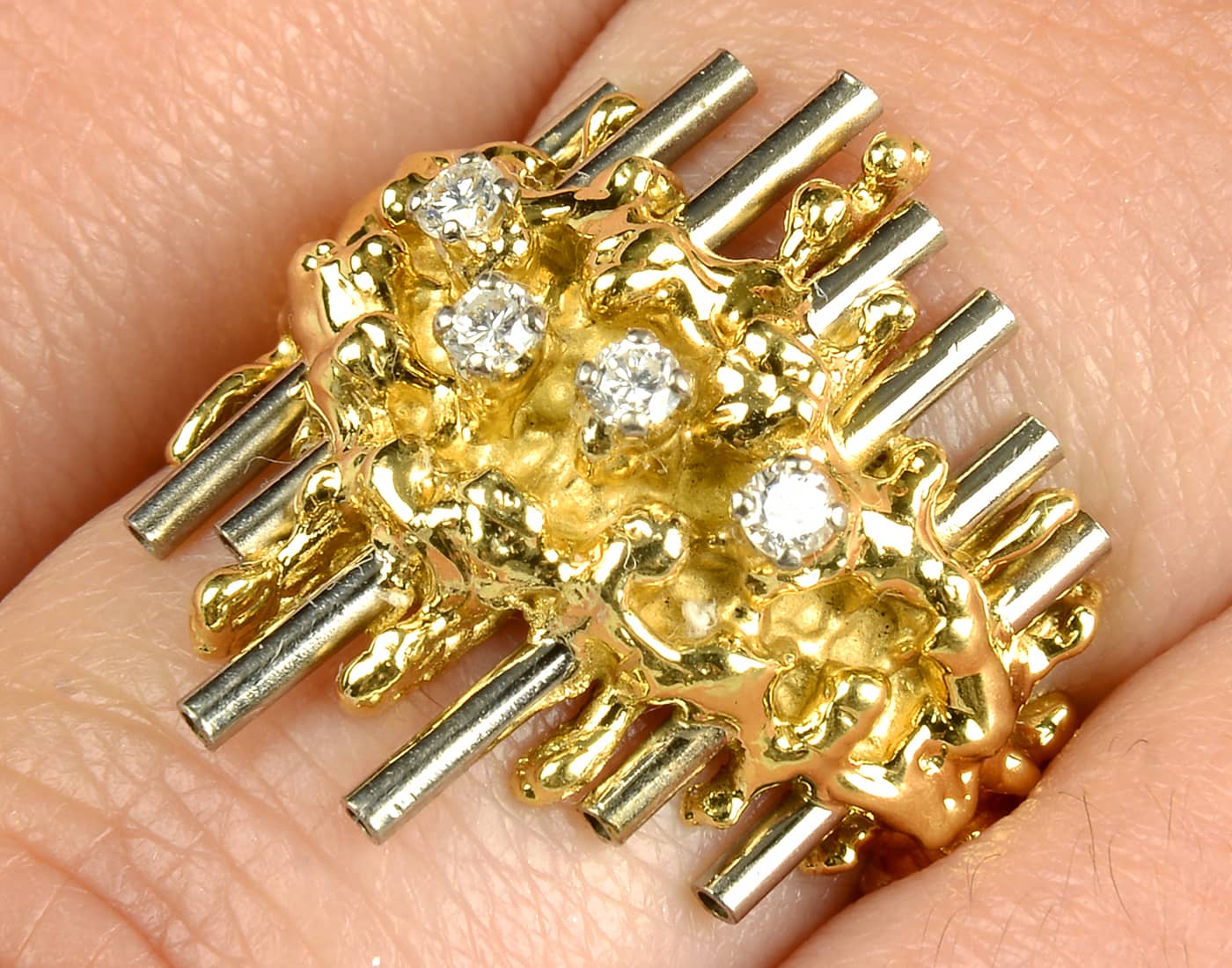 A 1970s bi-colour gold brilliant-cut diamond ring by David Thomas