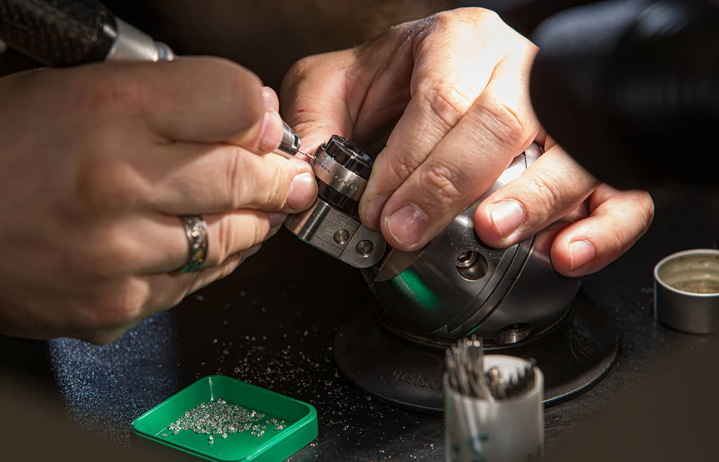 Preparing to set diamonds in a wedding band at the International Jewellery School in St Petersburg 