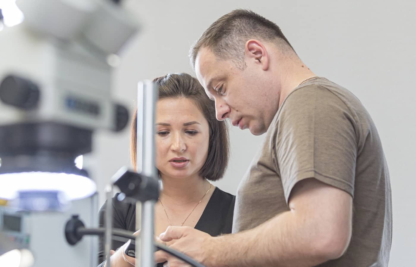  Roman Karakurkchi supports a student with her work at the International Jewellery School in St Petersburg