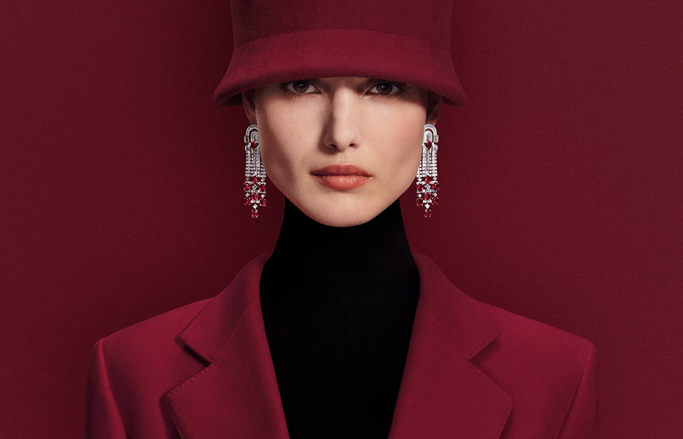  Rolling Red pendant earrings set with 16 oval rubies from Mozambique with a total weight of 17.35 carats, paved with diamonds in 18k white gold from the Boucheron Like a Queen High Jewellery Collection