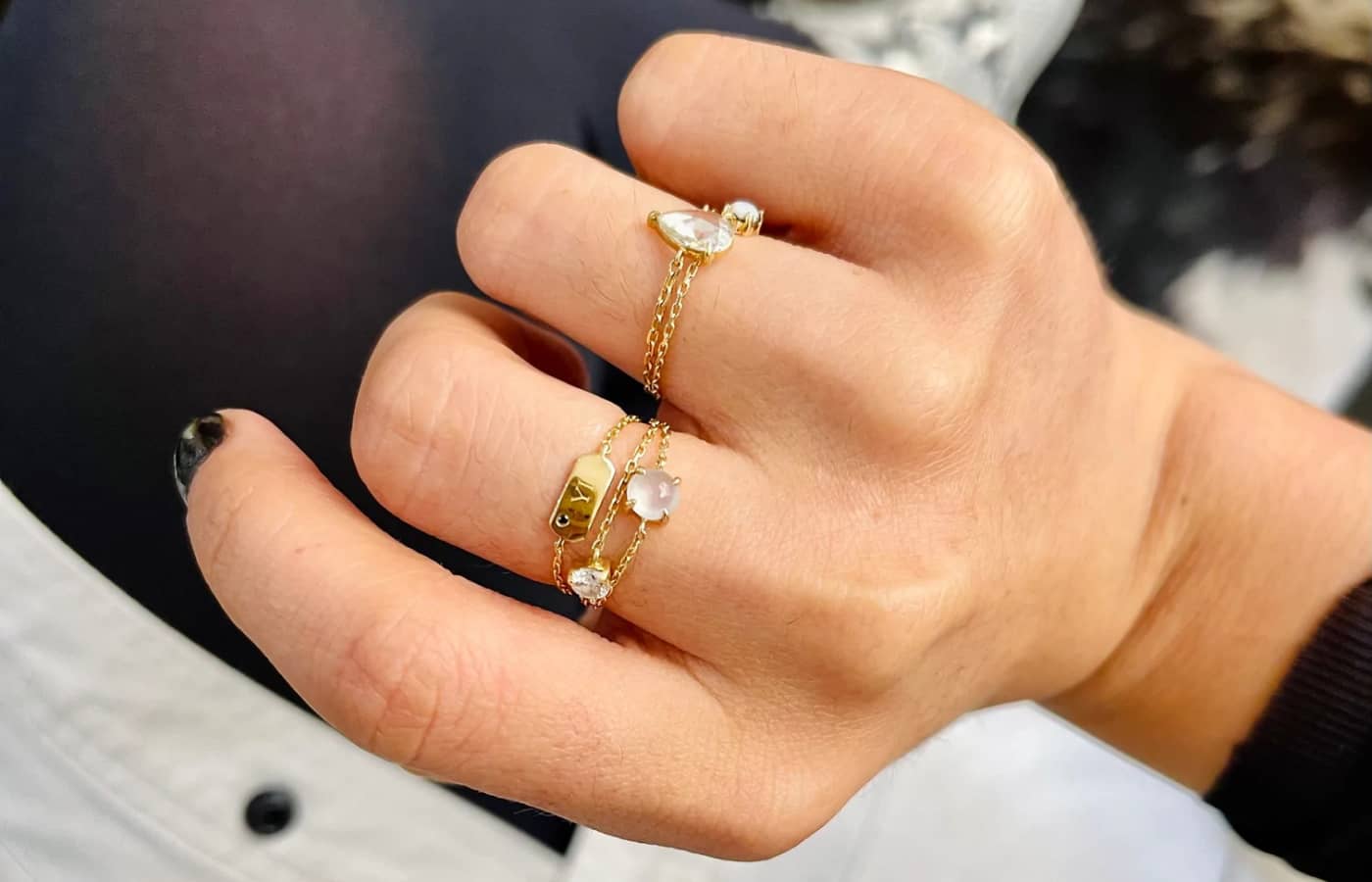 Model wearing Yi Collection gold and diamond rings