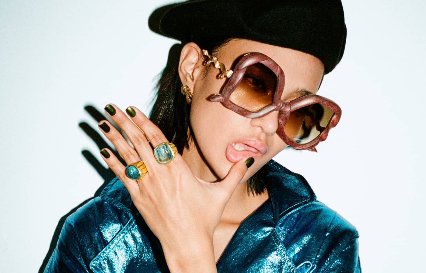  Model wearing Francis de Lara gold and aquamarine rings