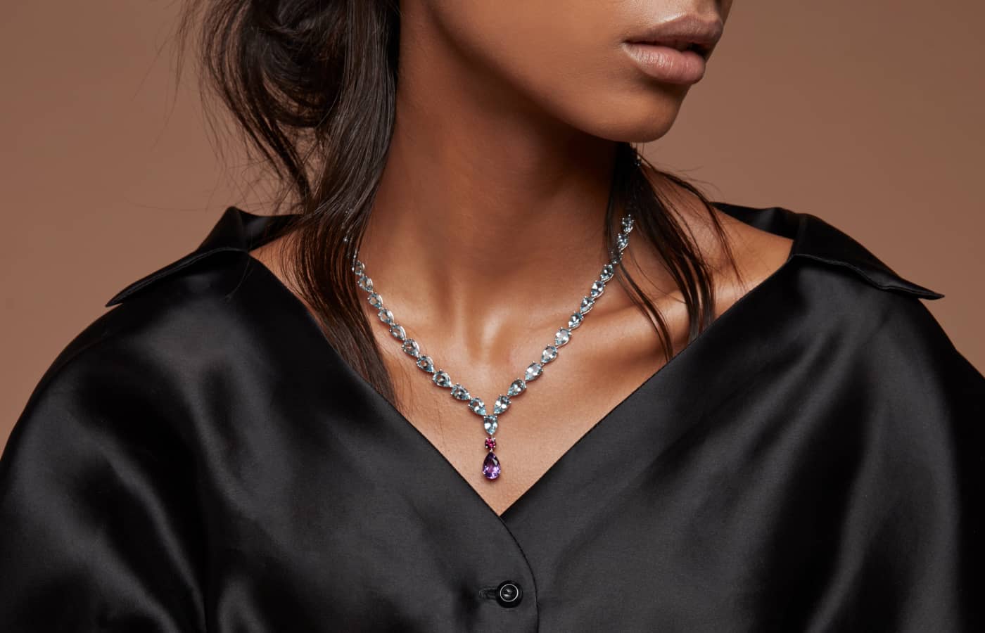  Model wearing Noora Shawqi white gold, aquamarine and amethyst necklace