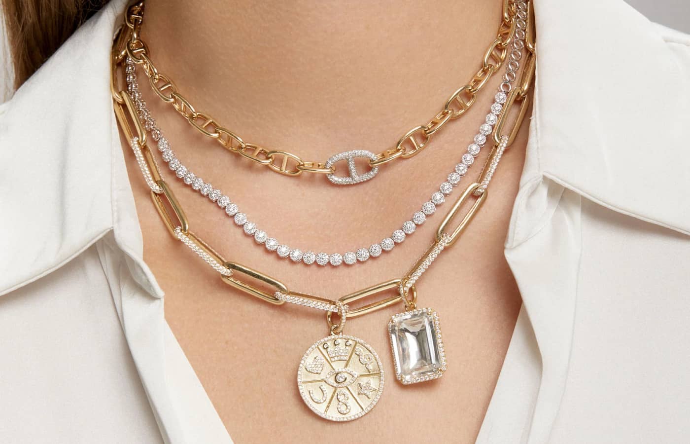  Model wearing Anne Sisteron gold, diamond and topaz Luxe Jolly Charm pendant