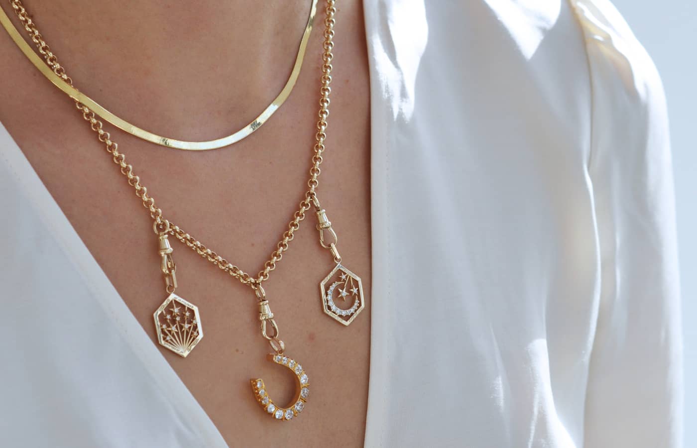Ashley Zhang Dog Clip necklaces in gold and diamond