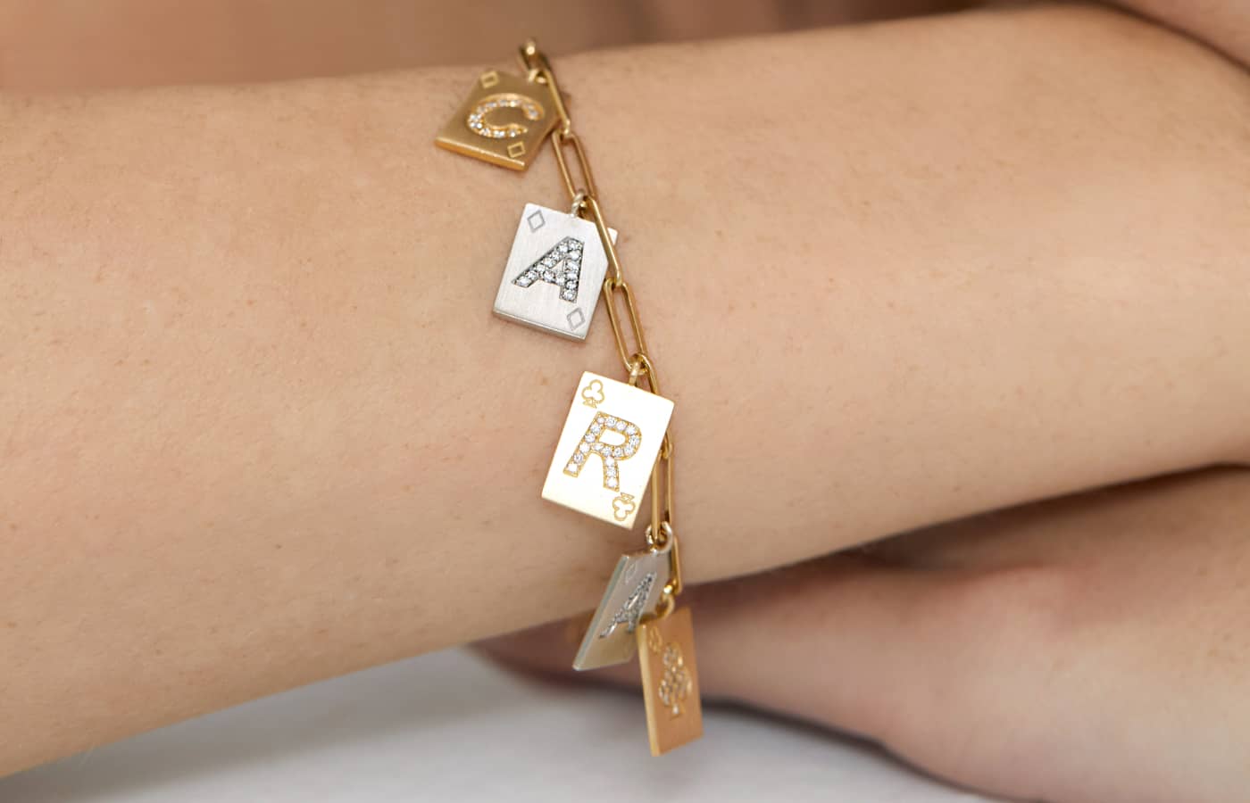  Mystery Joy Charm bracelet in gold and lab grown diamonds 