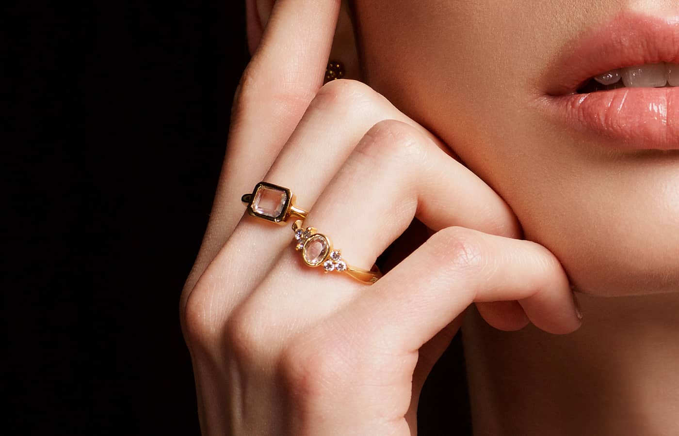 Model wearing Kelty Pelechytik gold and diamond rings