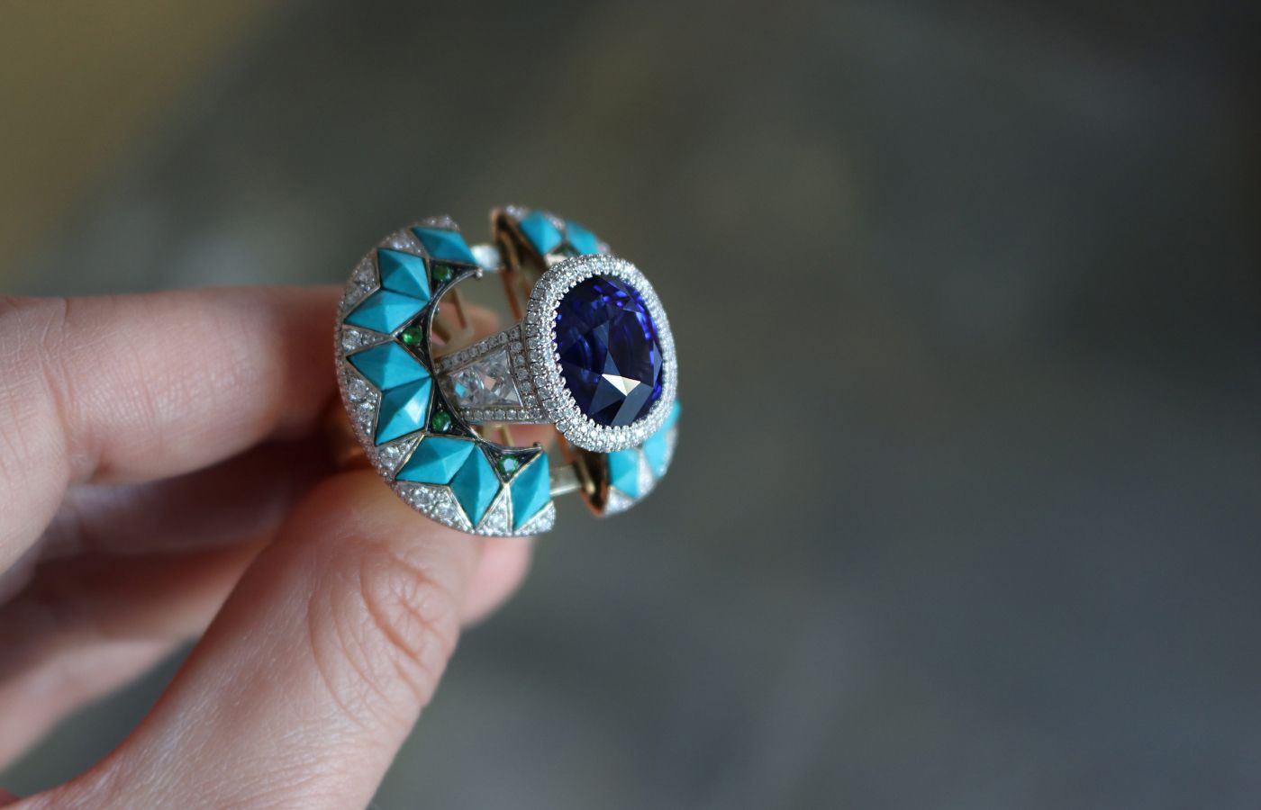  Ricardo Basta designed this piece so the inner sapphire and diamond ring can be worn alone or with its turquoise, diamond and tsavorite jacket