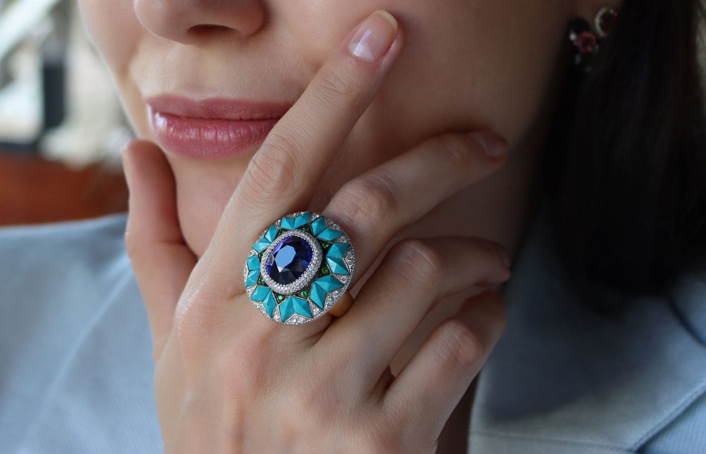 Ricardo Basta sapphire ring with a removable turquoise, tsavorite garnet and diamond ring jacket 
