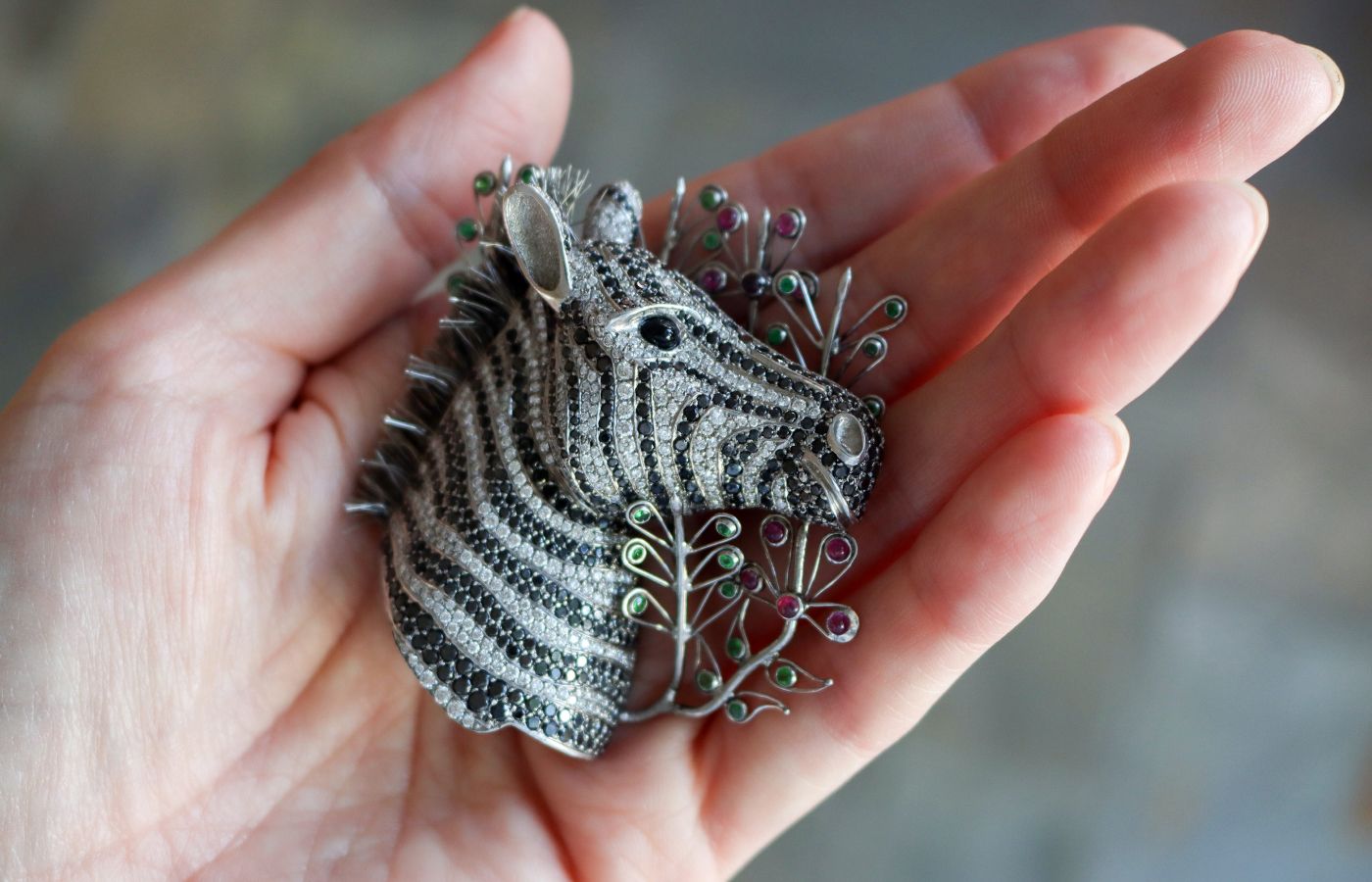 Ricardo Basta zebra brooch with black and white diamonds, rubies, tsavorites, and emeralds in palladium 