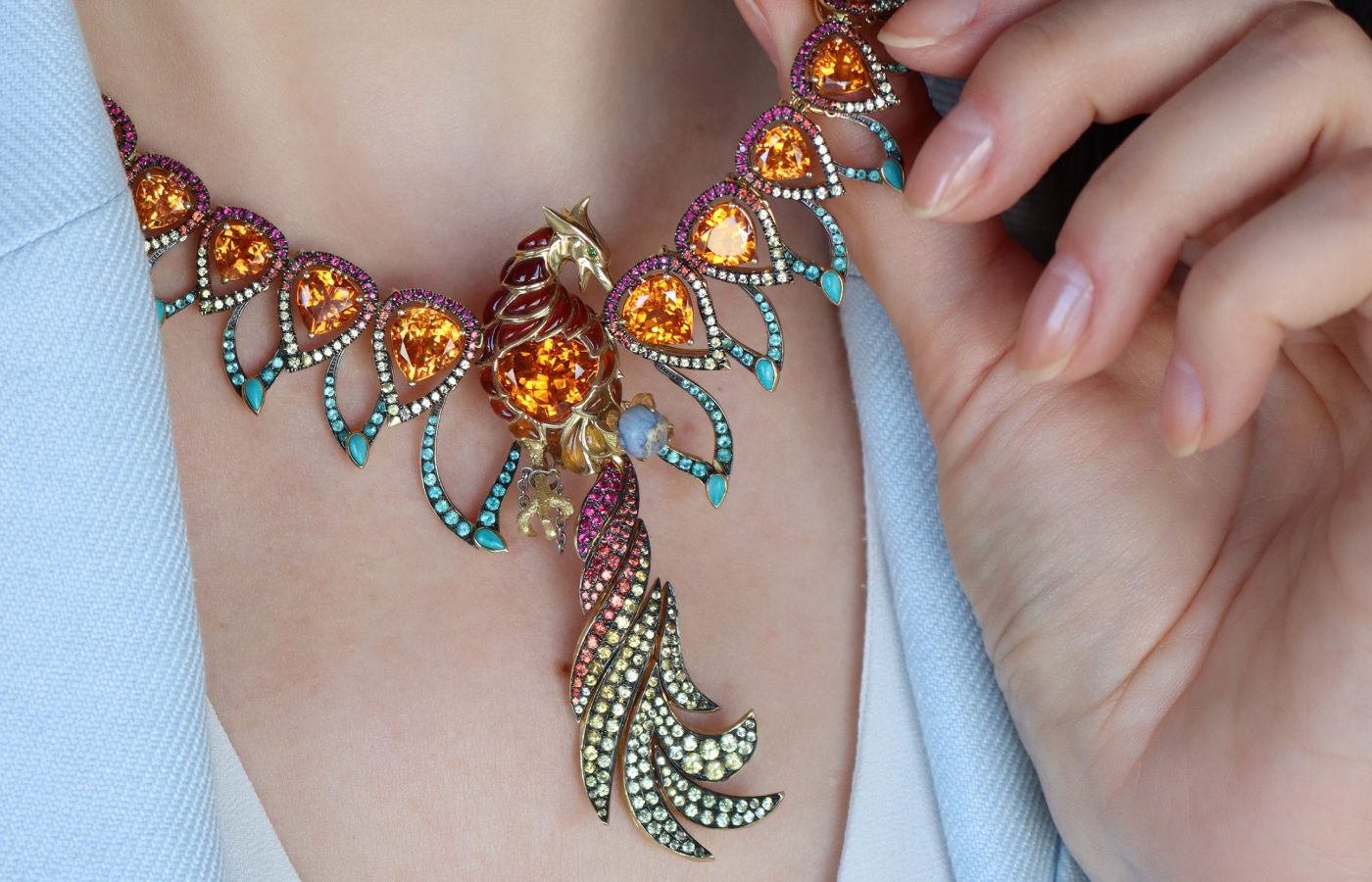 Ricardo Basta Phoenix Rising necklace with fire opals, spessartine garnets, Paraiba tourmalines, sapphires, rubies, tsavorites and turquoises in 18k yellow gold 